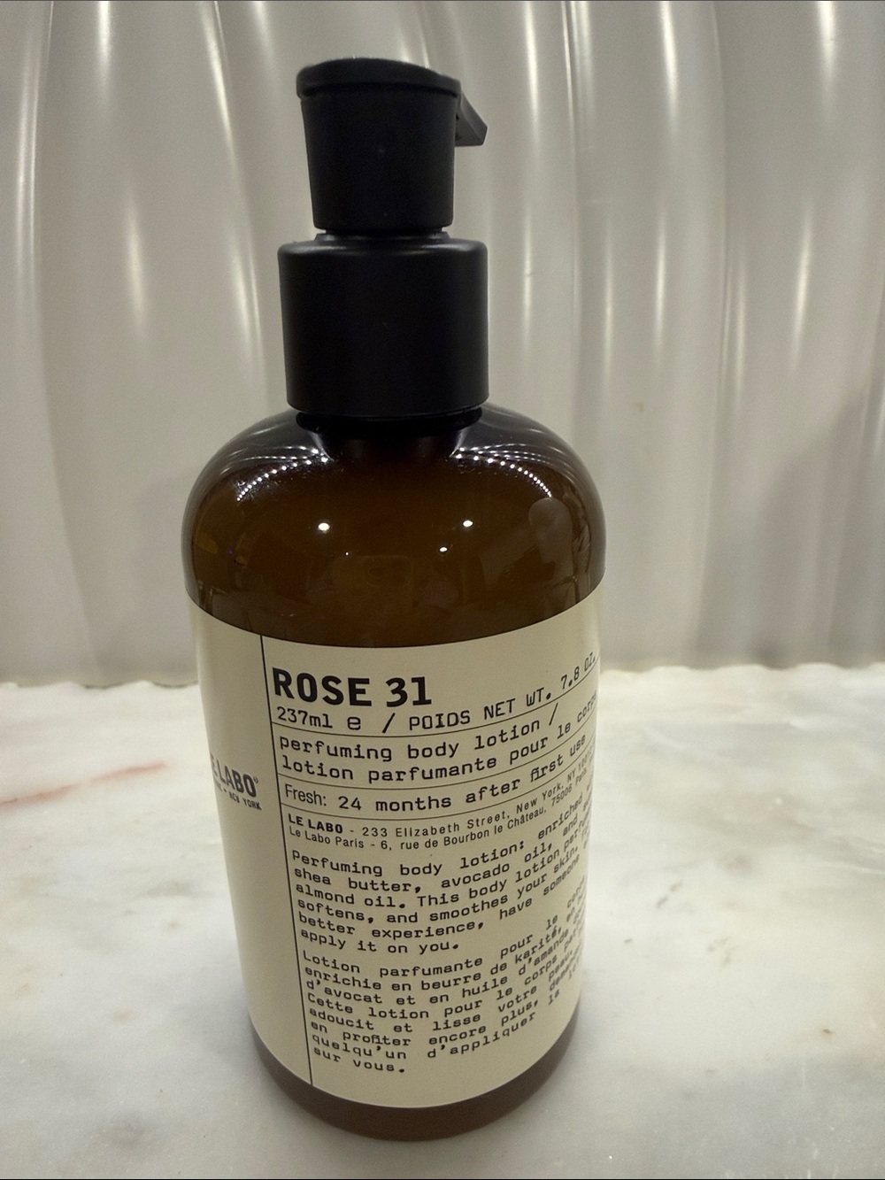 Le Labo Rose 31 Perfuming Body Lotion in amber-brown bottle